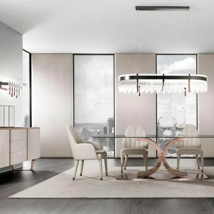 Elite DV Home Collection armchair with smooth light beige fabric upholstery and sleek copper-tone steel feet