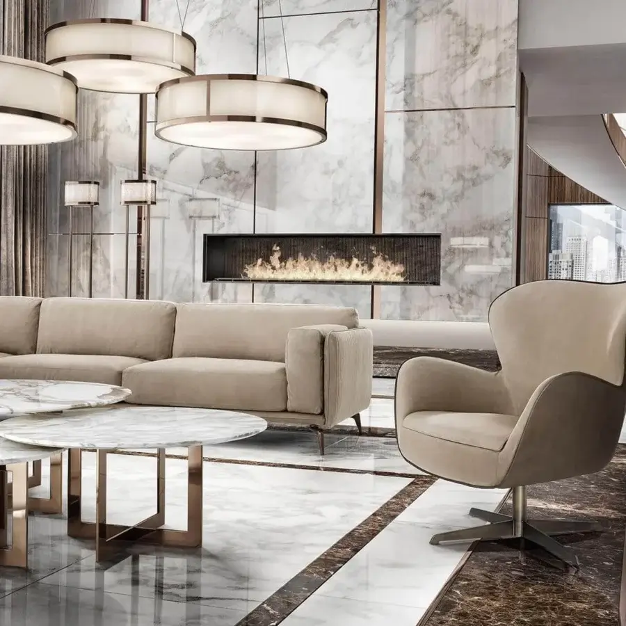 Distinguished DV Home Collection lounge chair molded in polyurethane with refined beige fabric and dark finished metal base