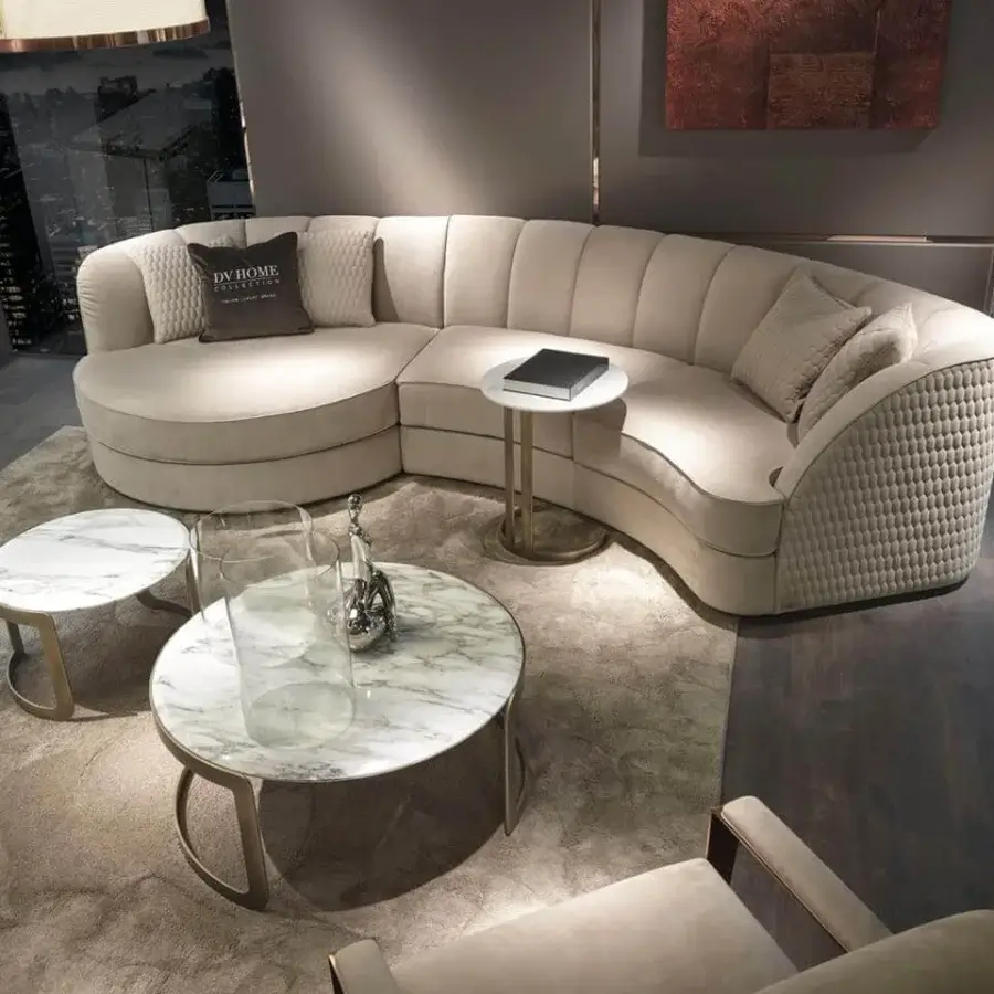 Refined DV Home Collection Charlotte Island sofa upholstered in light beige textile with a matte finish and unique hexagonal quilting