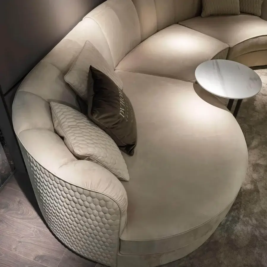 Exclusive DV Home Collection Charlotte Island sofa upholstered in light beige fabric with hexagonal quilting and a matte finish