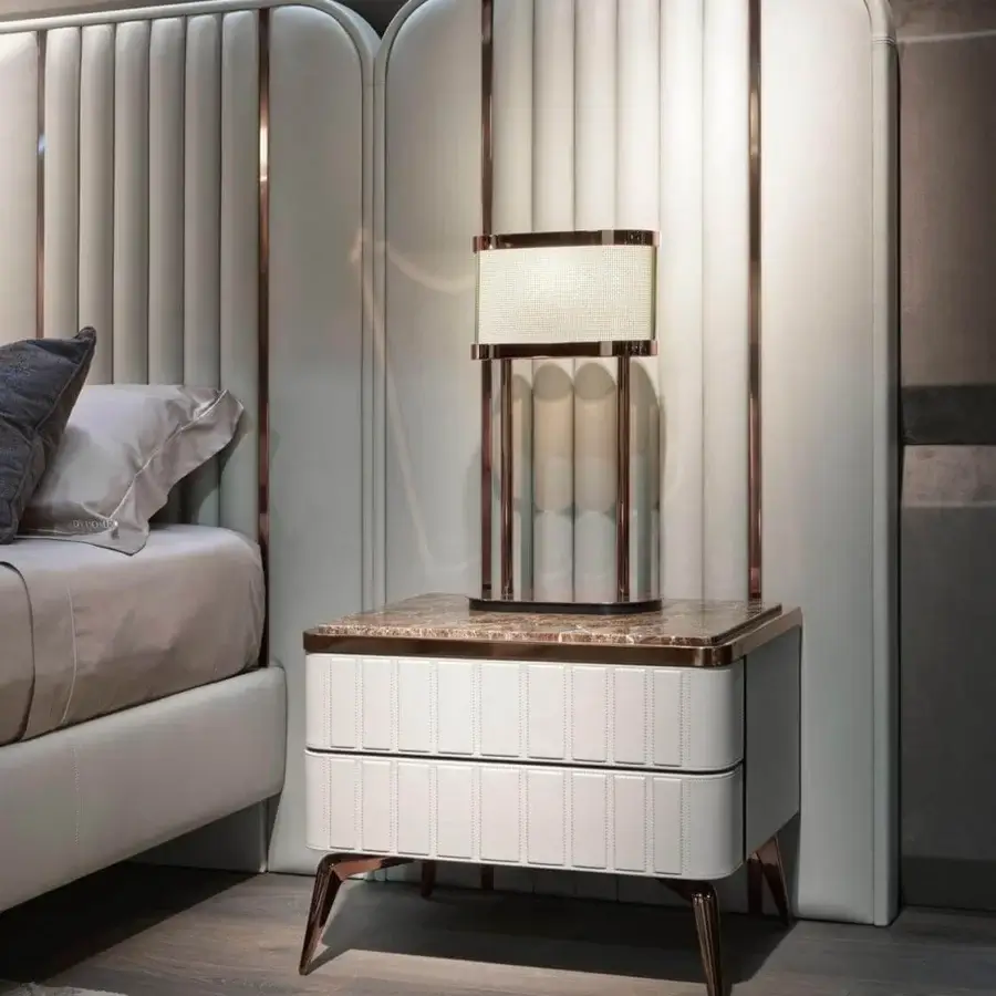 Superior DV Home Collection Hollywood Maxi bed crafted in Italy with light-colored fabric upholstery and refined copper-like steel inserts