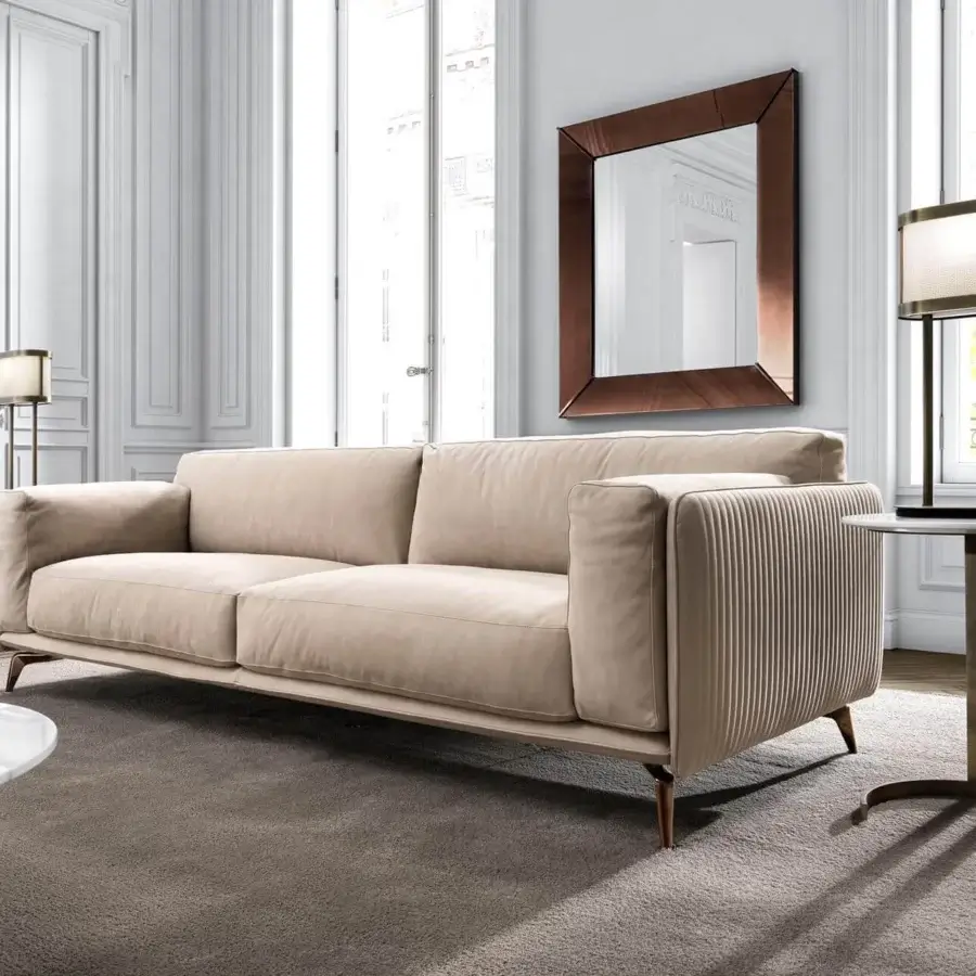 Exceptional DV Home Collection Elite sofa with light beige textile upholstery and Cannetè quilted leather armrests