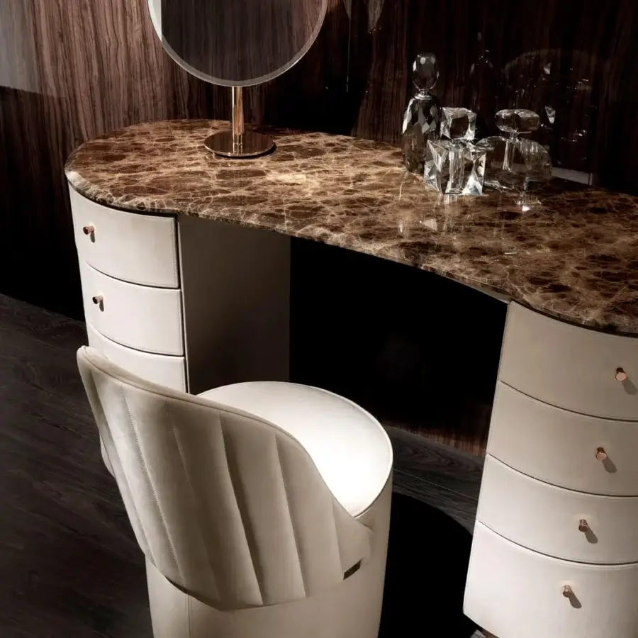 Distinguished DV Home Collection Tiffany vanity crafted with leather, marble and beechwood plywood with copper knobs and smooth finish