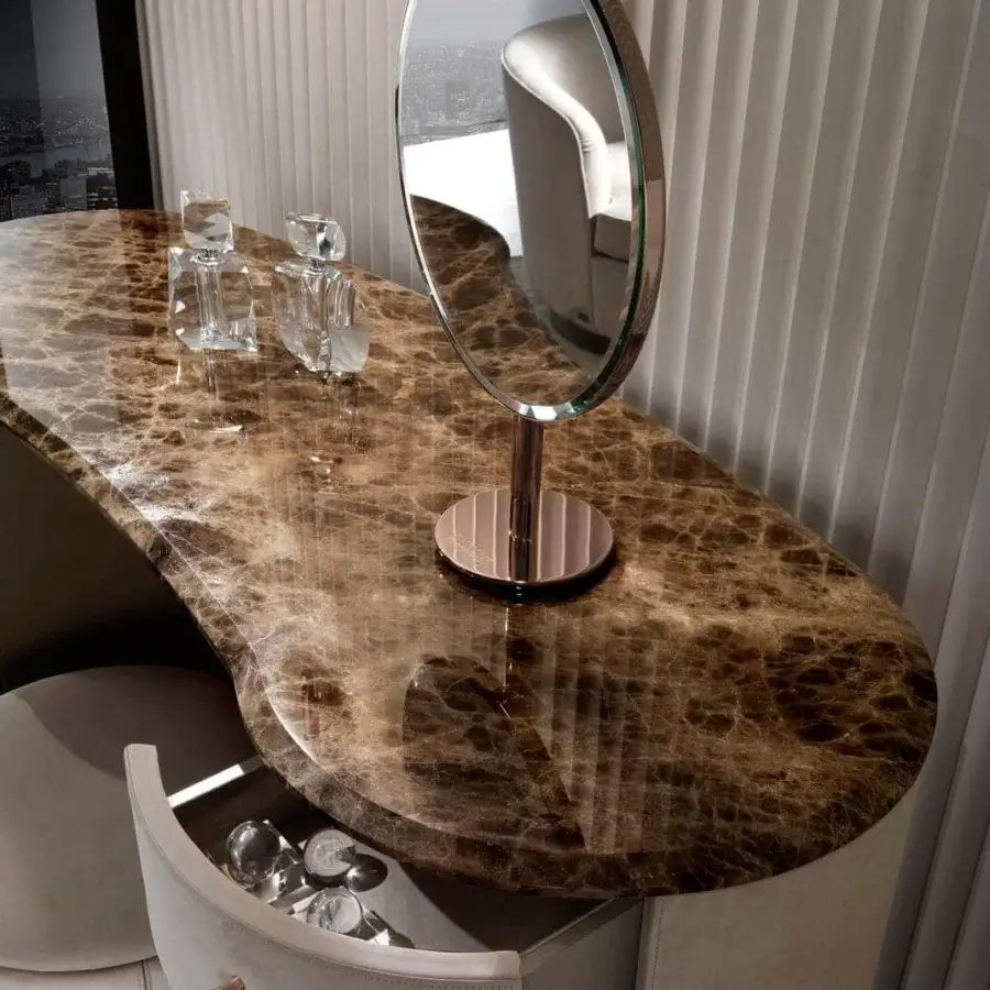 Exceptional DV Home Collection Tiffany vanity built with light beige leather, brown marble and rose gold finished mirror