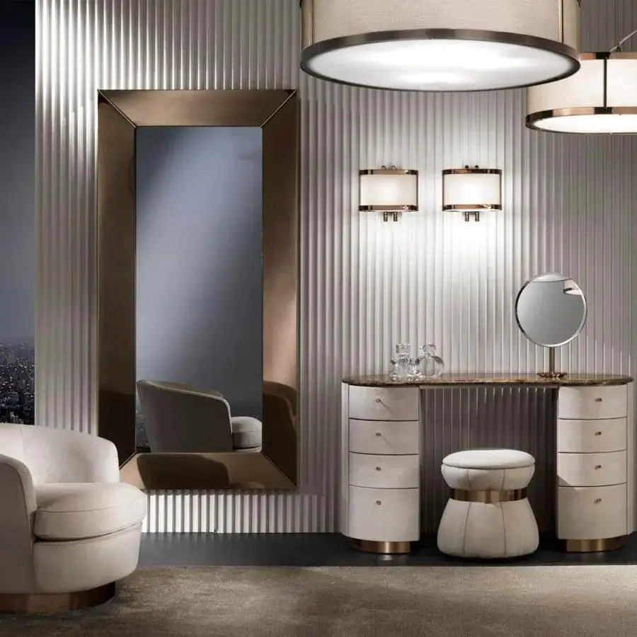 Innovative DV Home Collection Coco ottoman in light beige fabric upholstery with a bronze tone steel insert and beech wood structure