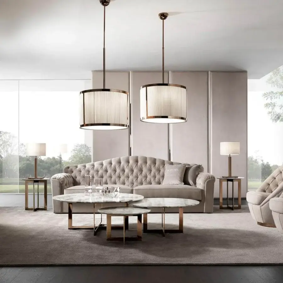 Distinguished DV Home Collection Windsor table lamp crafted in glossy metal with a light beige fabric lampshade