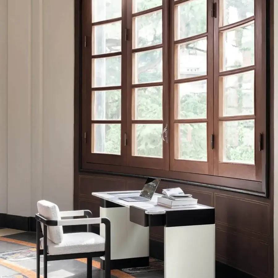 Superior Giorgetti Montgomery armchair with dark toned solid ash structure and cream textile upholstery in matte finish