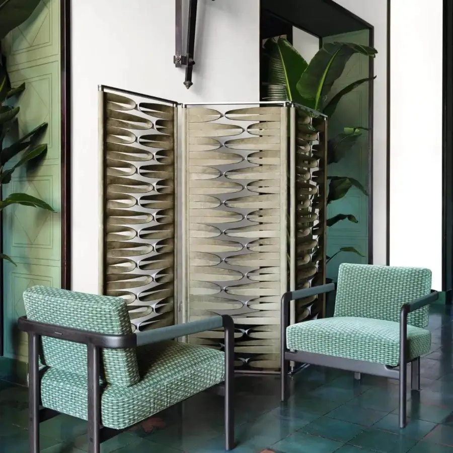 Distinguished Giorgetti Borealis room divider with rotating aluminum panels and a beige leather band secured with eyelets