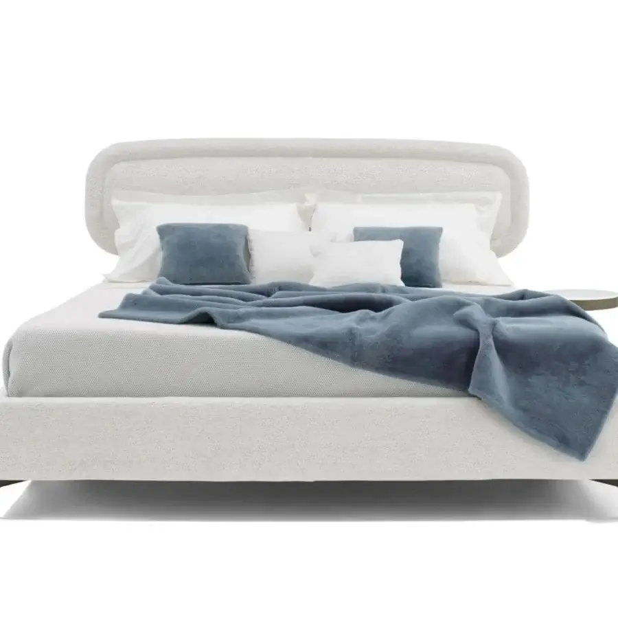 Distinguished Giorgetti Vibe bed with rounded upholstered headboard and elegant metal feet in light textured fabric