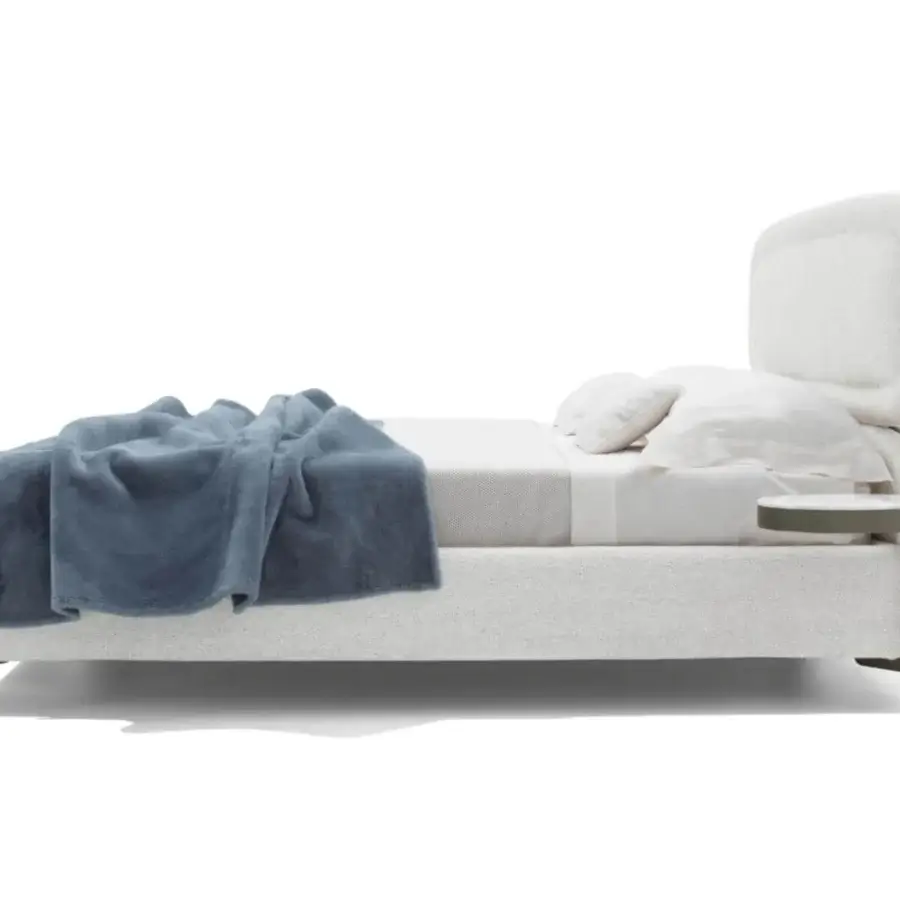 Elegant Giorgetti Vibe bed with light textile upholstery and Canaletto walnut accents inspired by 1930s design
