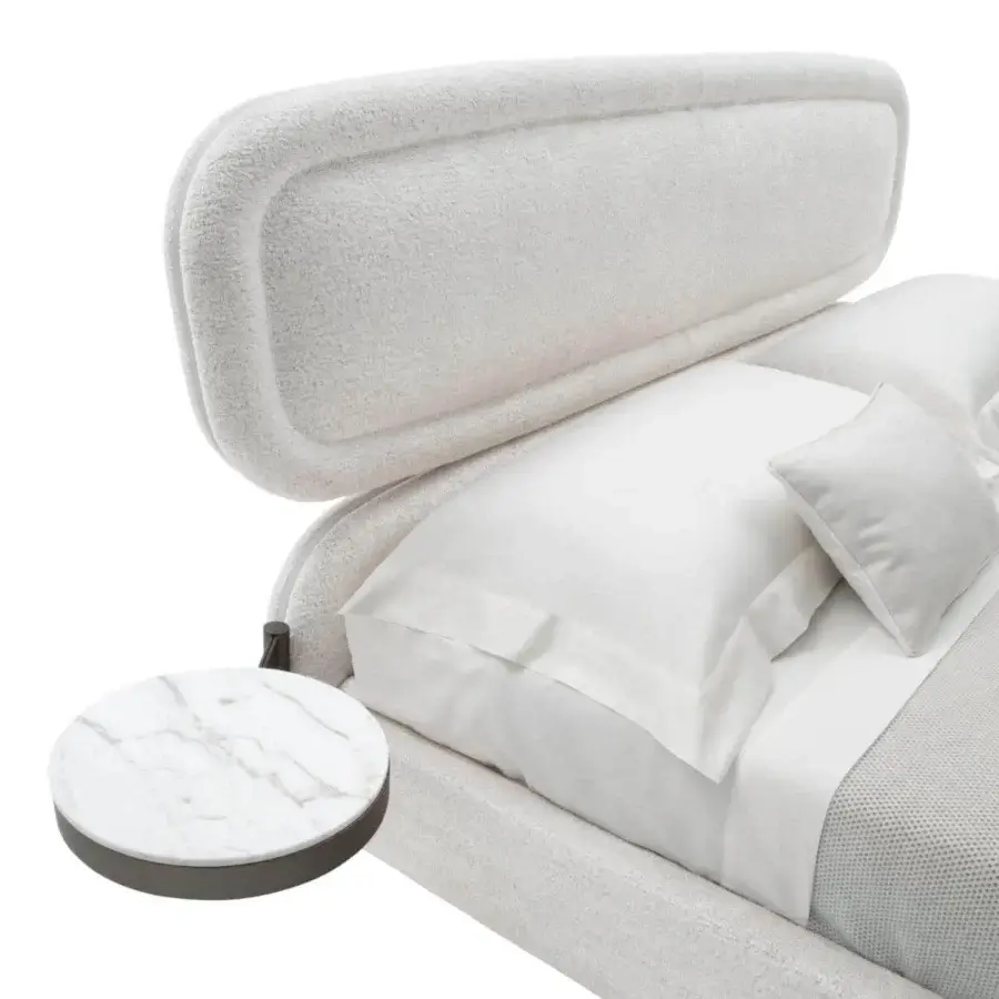 Superior Giorgetti Vibe bed with rounded headboard and frame in textured off-white fabric, complemented by white marble bedside tables with dark gray metal feet