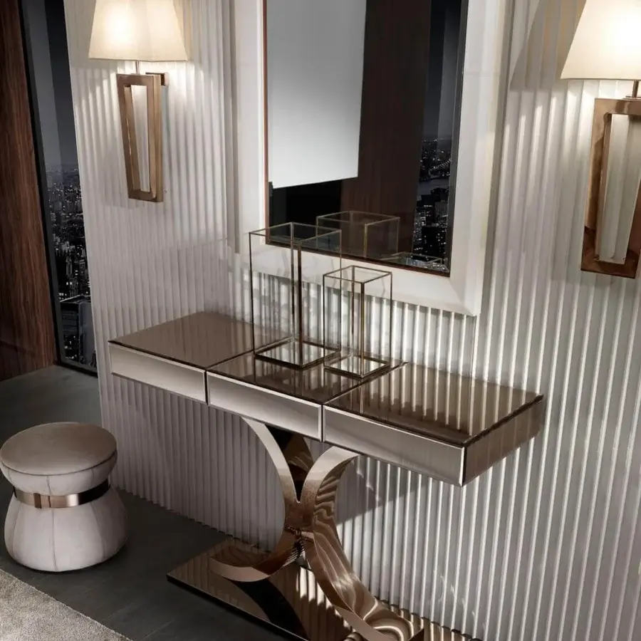 Distinguished DV Home Collection Deco wall lamp with a brassy gold metal structure and refined cream fabric lampshade