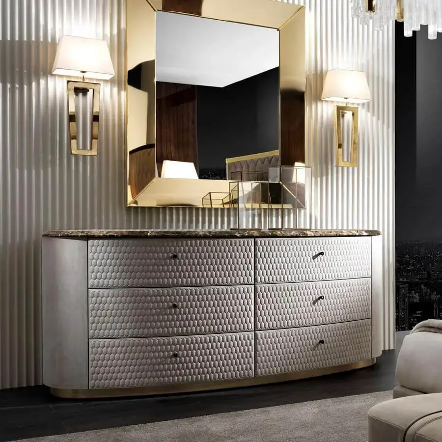 Lavish DV Home Collection Deco wall lamp with gold-toned metal and a refined white fabric lampshade