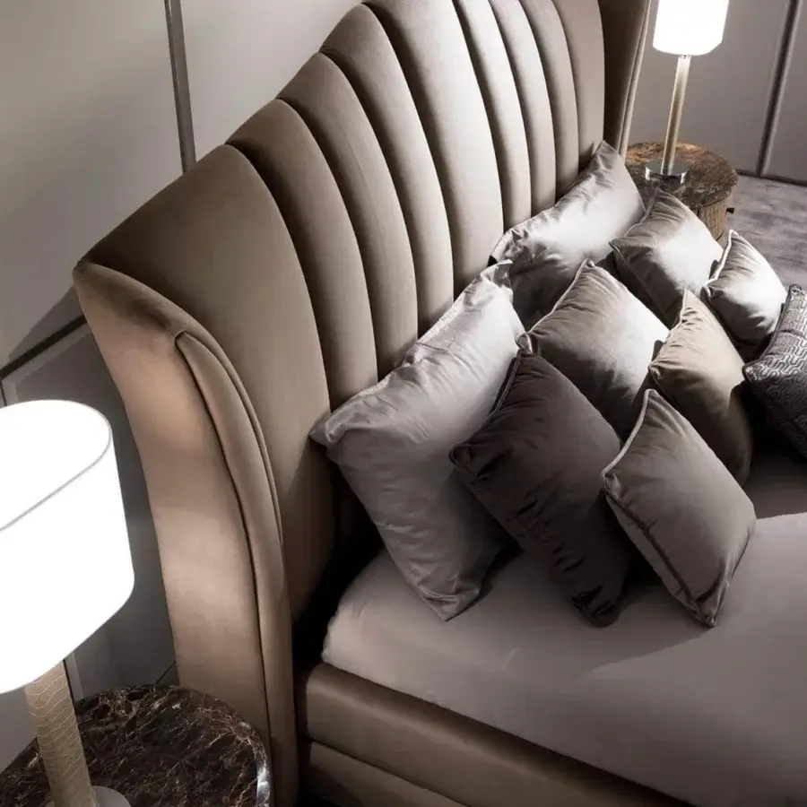 Lavish DV Home Collection vanity bed with light brown textile upholstery and refined vertical quilting details