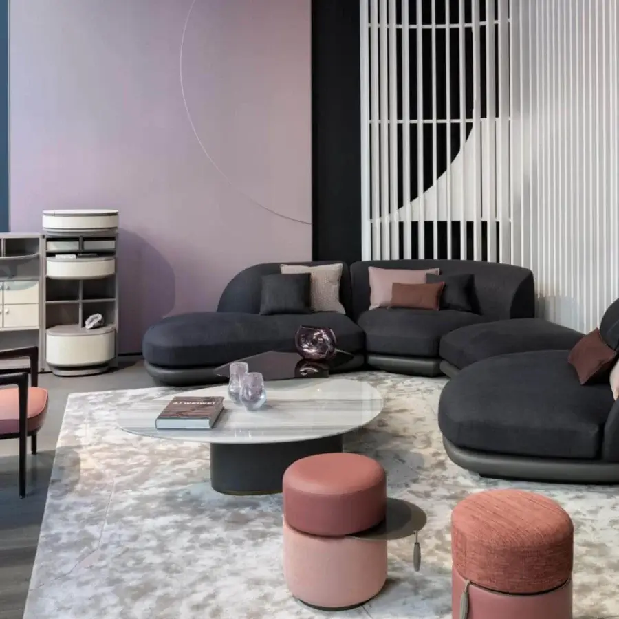 Superior Giorgetti Otto ottoman with terracotta textile and muted pink base, built with a painted steel swivel table and grey leather pull