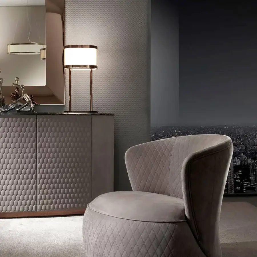 Elegant DV Home Collection Soho lounge chair with light gray quilted textile and swivel base crafted in solid wood polyurethane