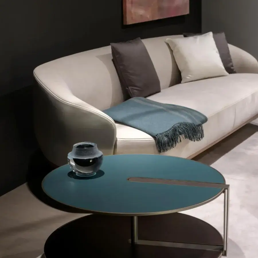 Distinguished Giorgetti Clamp coffee table with teal and dark brown lacquered frames plus metal accents and a slender post