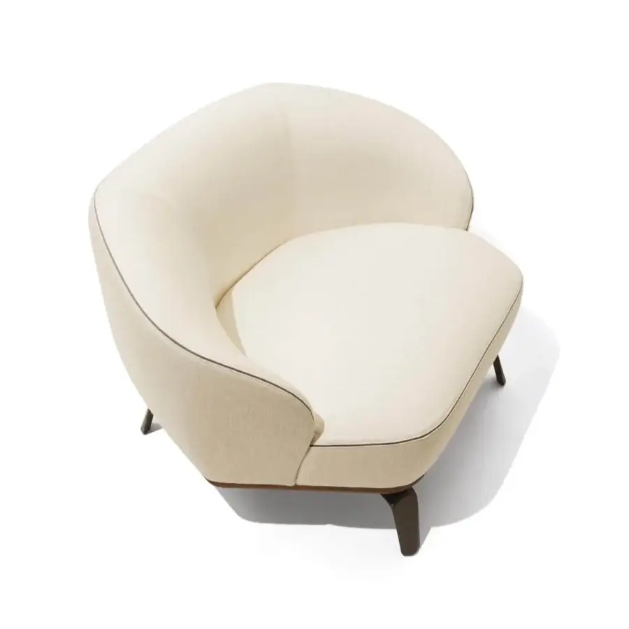 Sophisticated Giorgetti Tamino lounge chair with light beige textured textile upholstery and Canaletto walnut with metal feet
