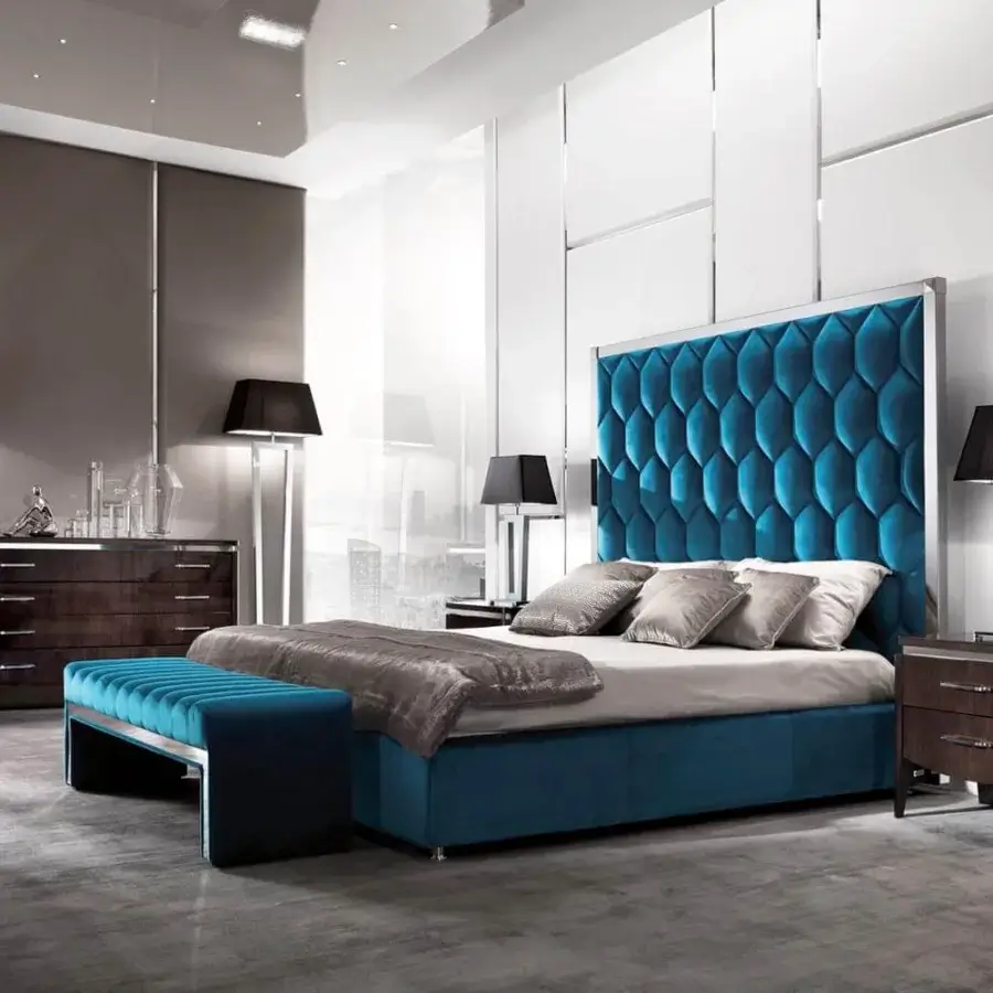 Refined DV Home Collection Deco table lamp with vibrant blue textile headboard and smooth metal structure