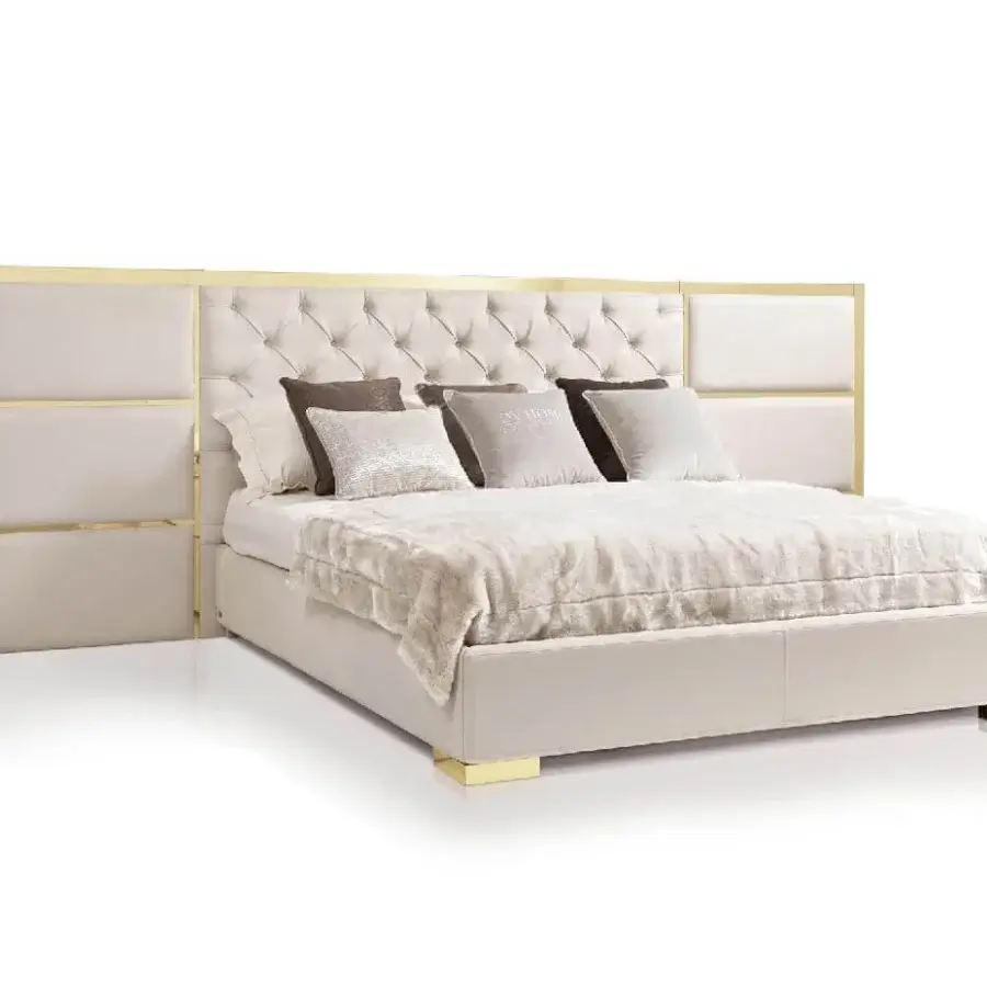 Distinguished DV Home Collection Chelsea bed with cream textile upholstery and golden metal detailing in a refined Italian design