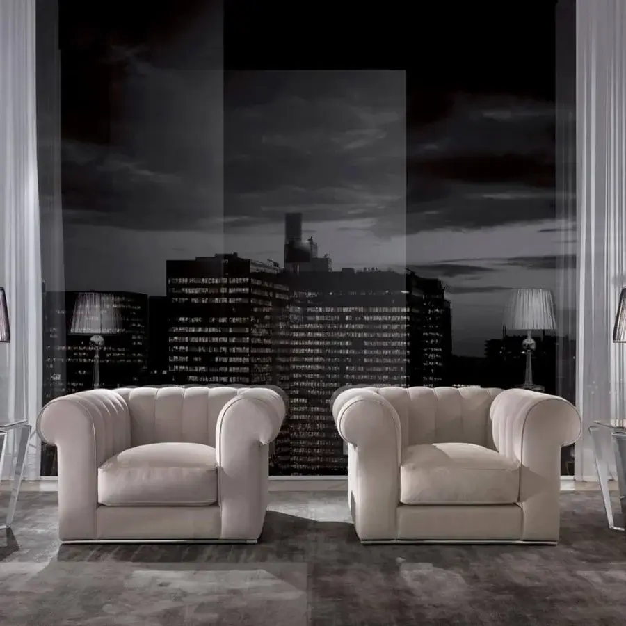 Sophisticated DV Home Collection lounge chair with light beige textile and smooth matte finish built upon a chrome metal base