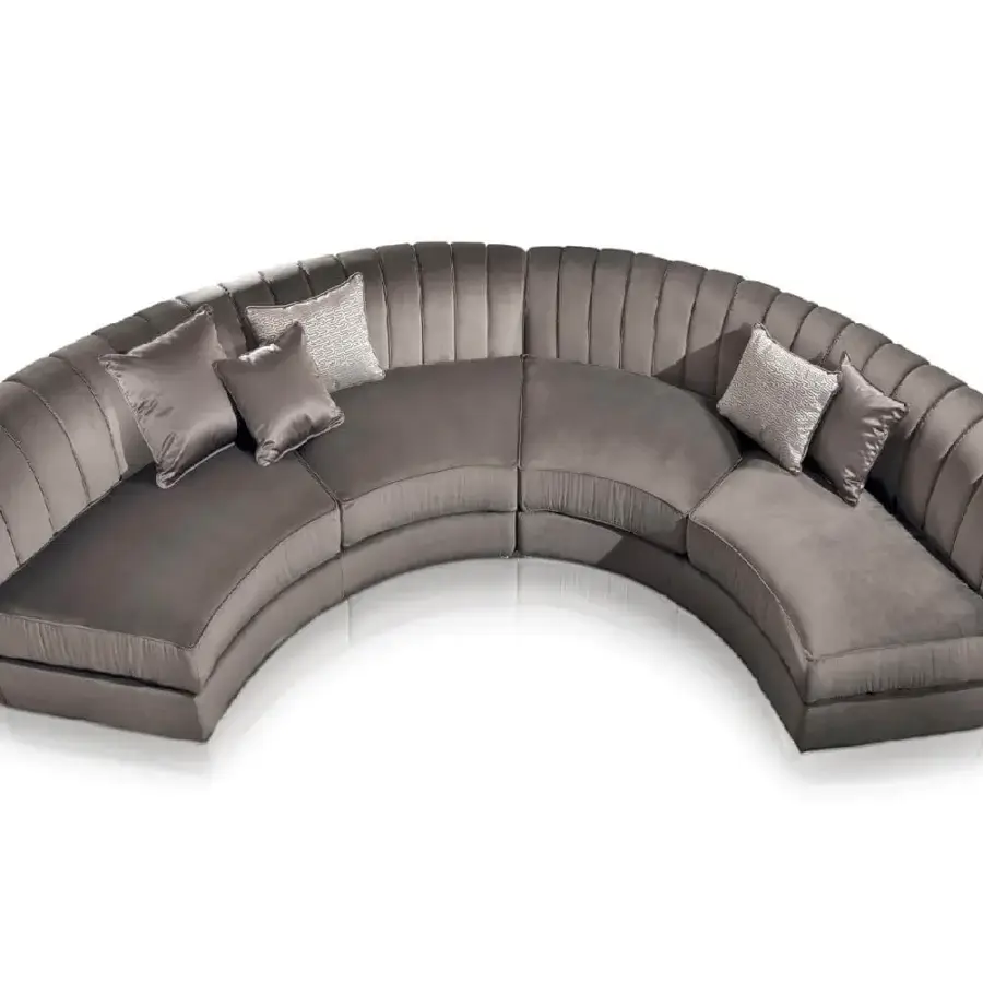 Lavish DV Home Collection Kent sofa upholstered in smooth gray textile with modern channel detailing and goose feather cushions