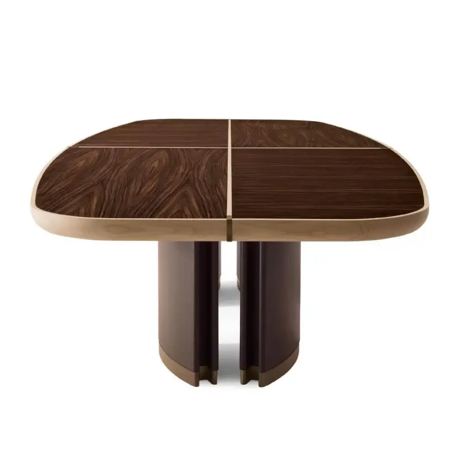 Exclusive Giorgetti Gordon table with shaped maple top and dark brown saddle leather base complemented with bronze painted details