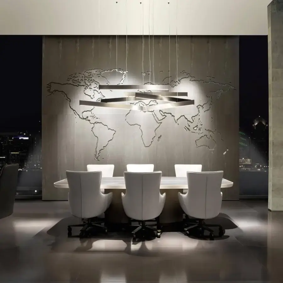 Superior Giorgetti Gordon table with light top, shaped inserts and saddle leather base with bronze painted details
