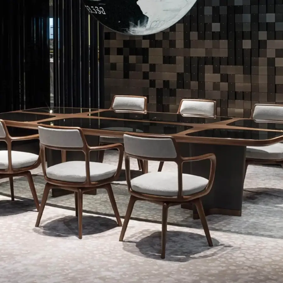 Elegant Giorgetti Bigwig table with shaped Canaletto walnut, tempered glass inserts and leather-covered star legs in glossy and matte finish