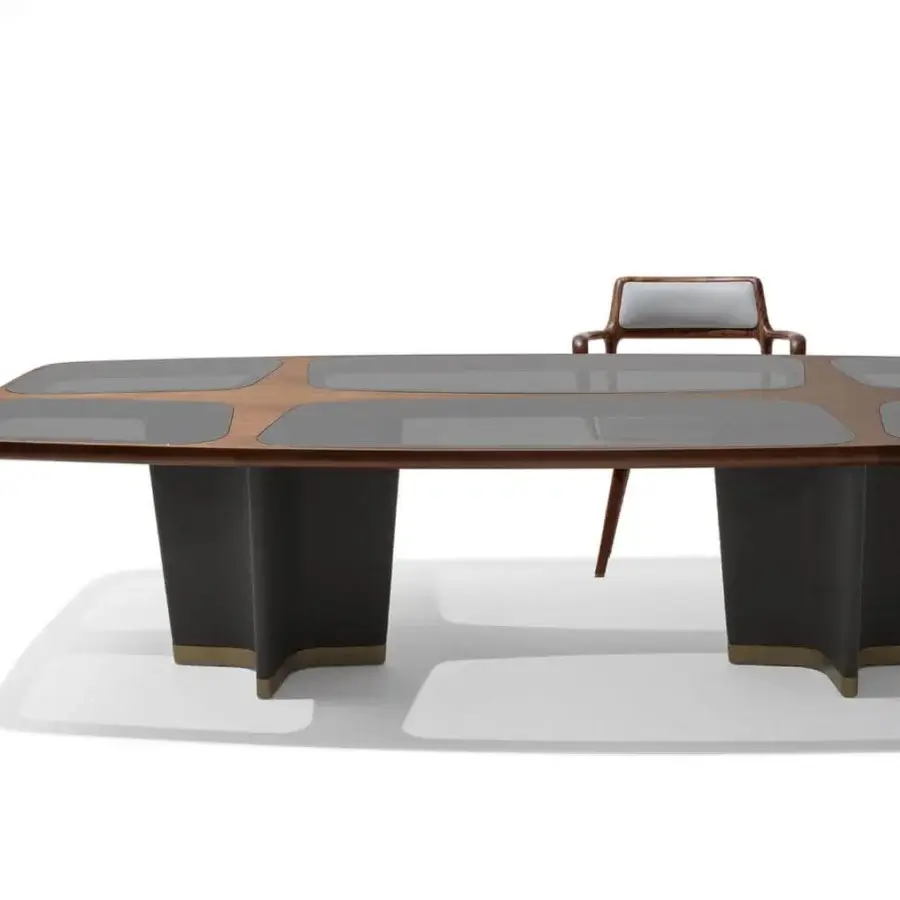 Innovative Giorgetti Bigwig table with shaped Canaletto walnut top, dark gray inserts and star-shaped legs with gold accents