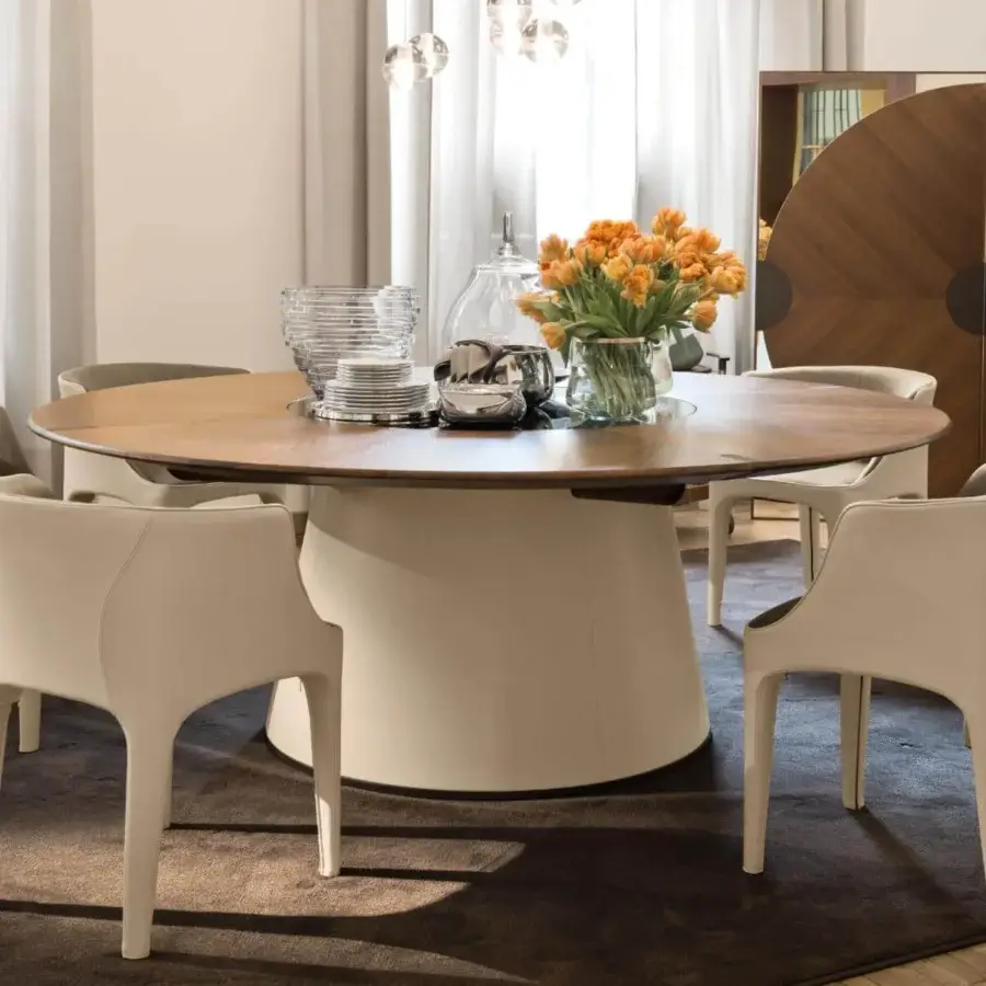 Elegant Giorgetti Fang round table with Canaletto walnut and light beige matte synthetic material base