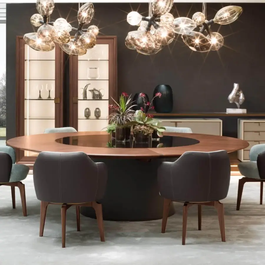 Exceptional Giorgetti Fang round table with Canaletto walnut and black Lazy Susan in smooth matte finish