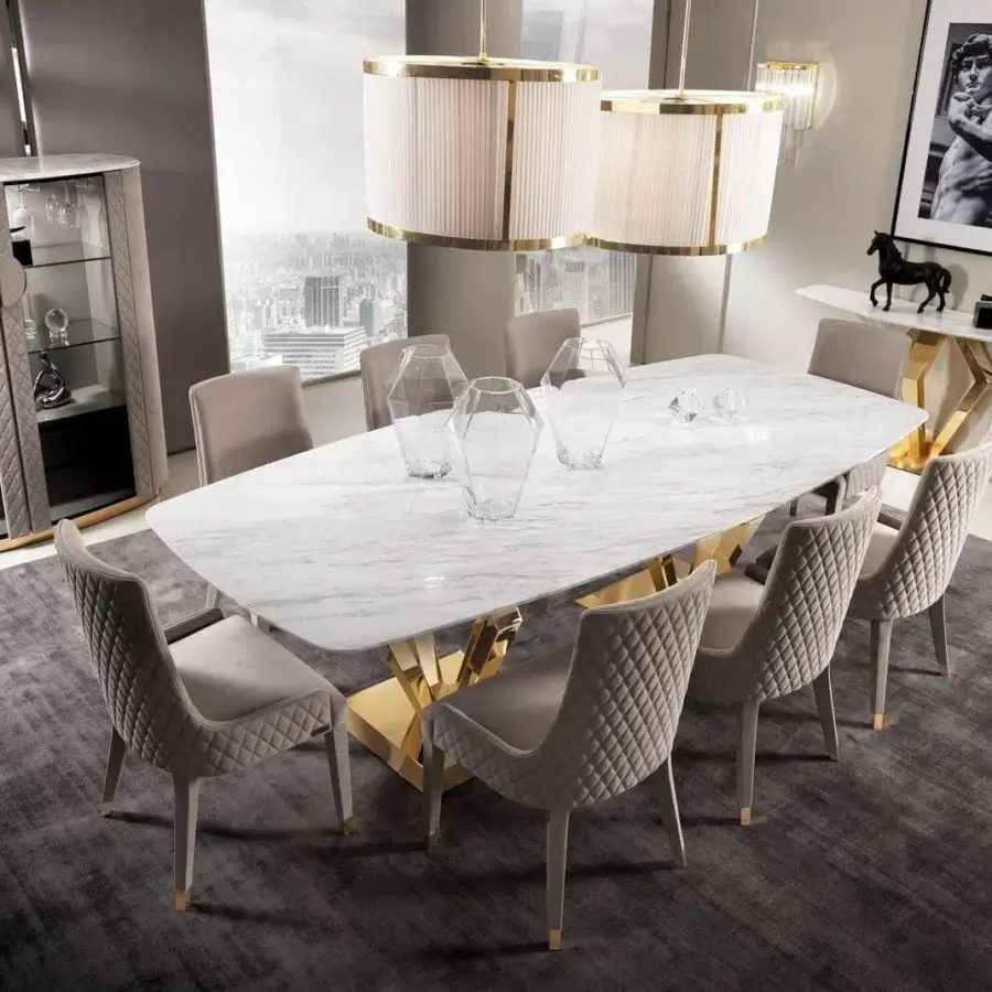 Innovative DV Home Collection Deco table with geometric gold stainless steel base and white marble-like finish
