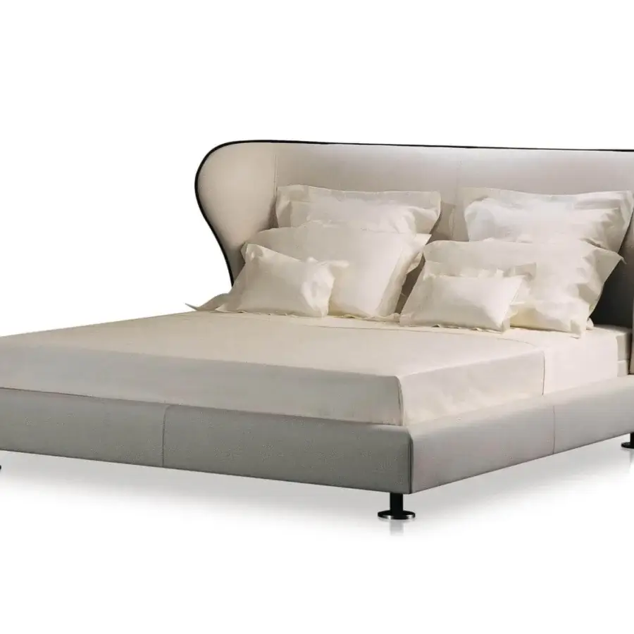 Elegant Giorgetti Rea bed with winged headboard in light gray textile and polished pau ferro metal feet