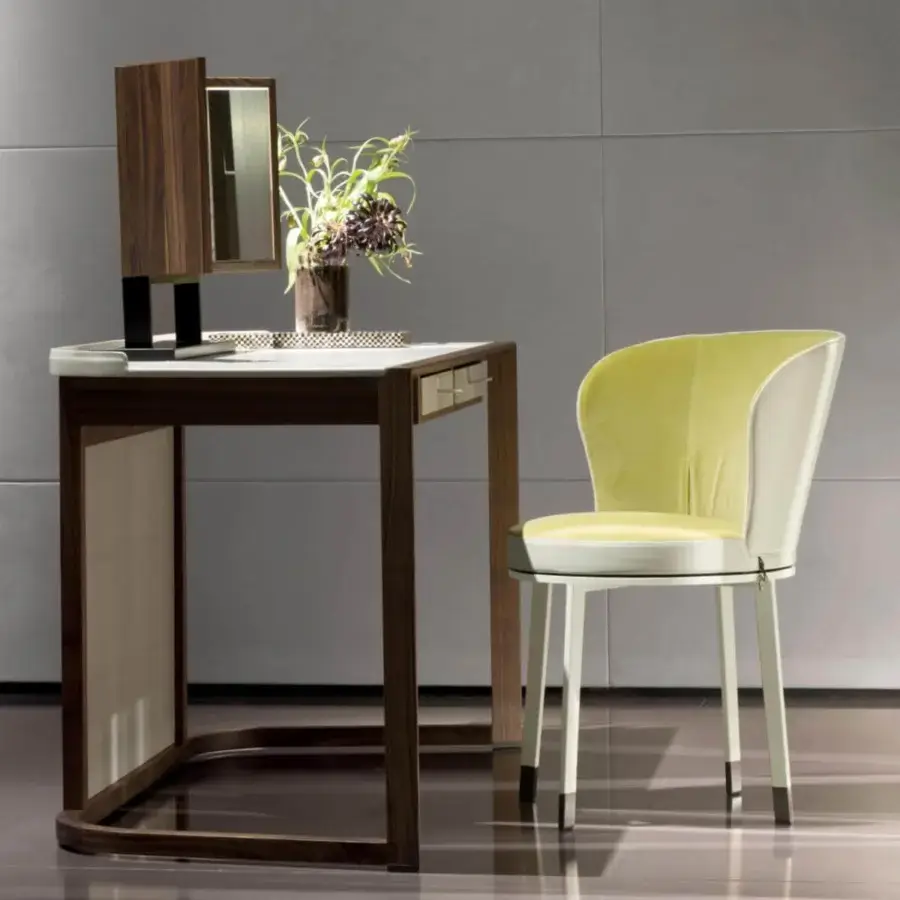 Elegant Giorgetti Ode chair with a vivacious rotating structure in light chartreuse and white textiles with a light-toned wood frame and metal feet