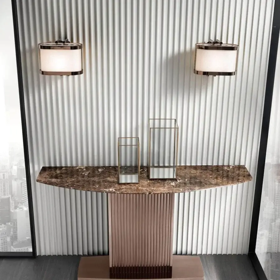 Refined DV Home Collection Windsor console with a marble-patterned top and matte bronze finished stainless steel pedestal base