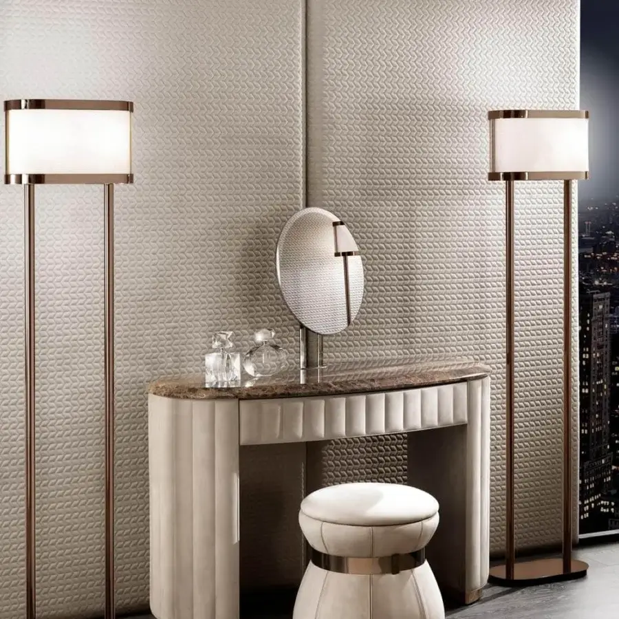 Distinguished DV Home Collection Coco vanity with a cream textile exterior and gold-colored metal trim, crafted in marble patterned top