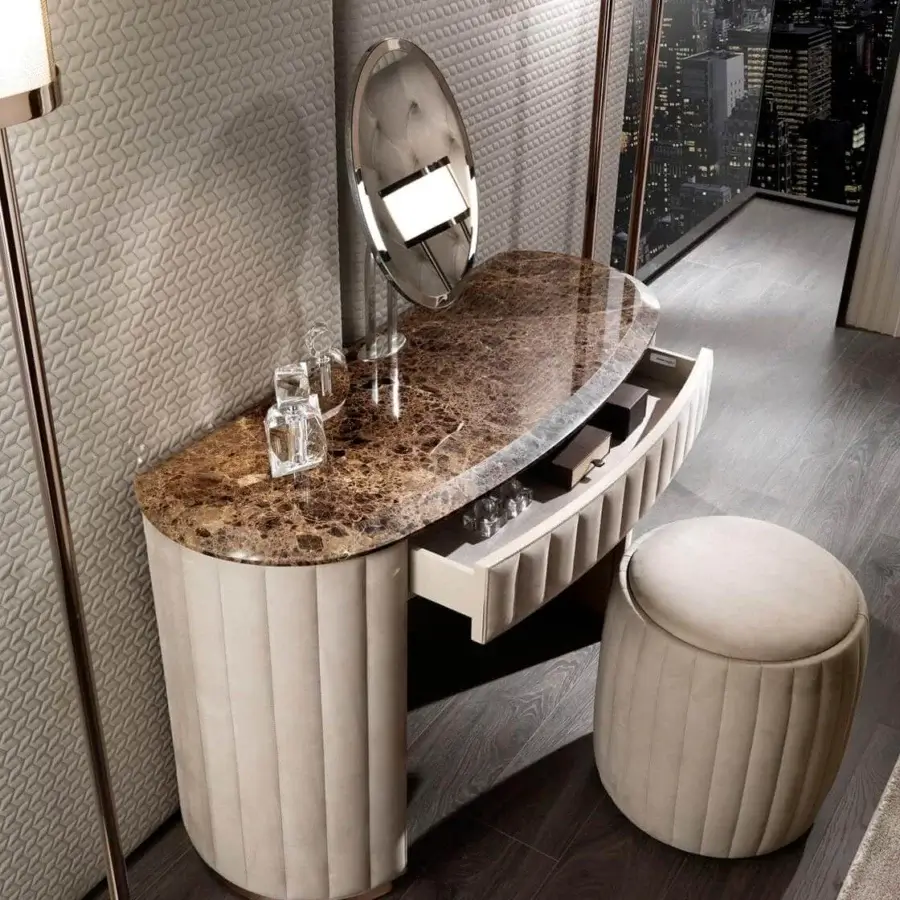 Elegant DV Home Collection Vogue vanity with a light beige textile base, glossy brown marble top and shining steel mirror kit