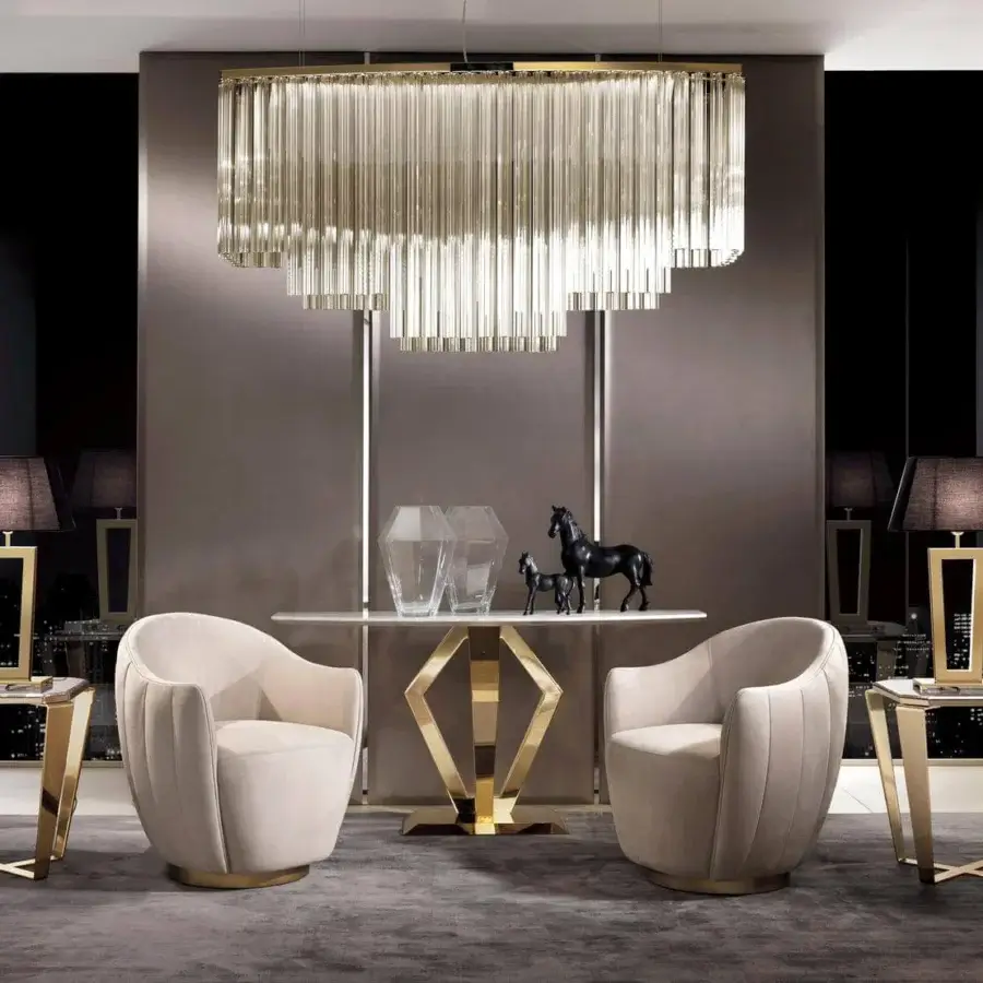 Elegant DV Home Collection Deco side table with gold glossy steel base and refined marble top