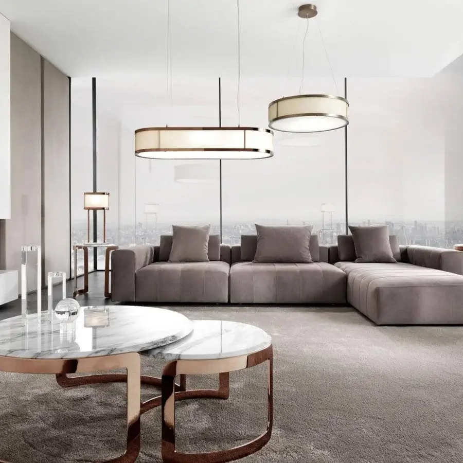 Elegant DV Home Collection Edmond sectional in soft gray-taupe textile with solid wood structure and clean lines