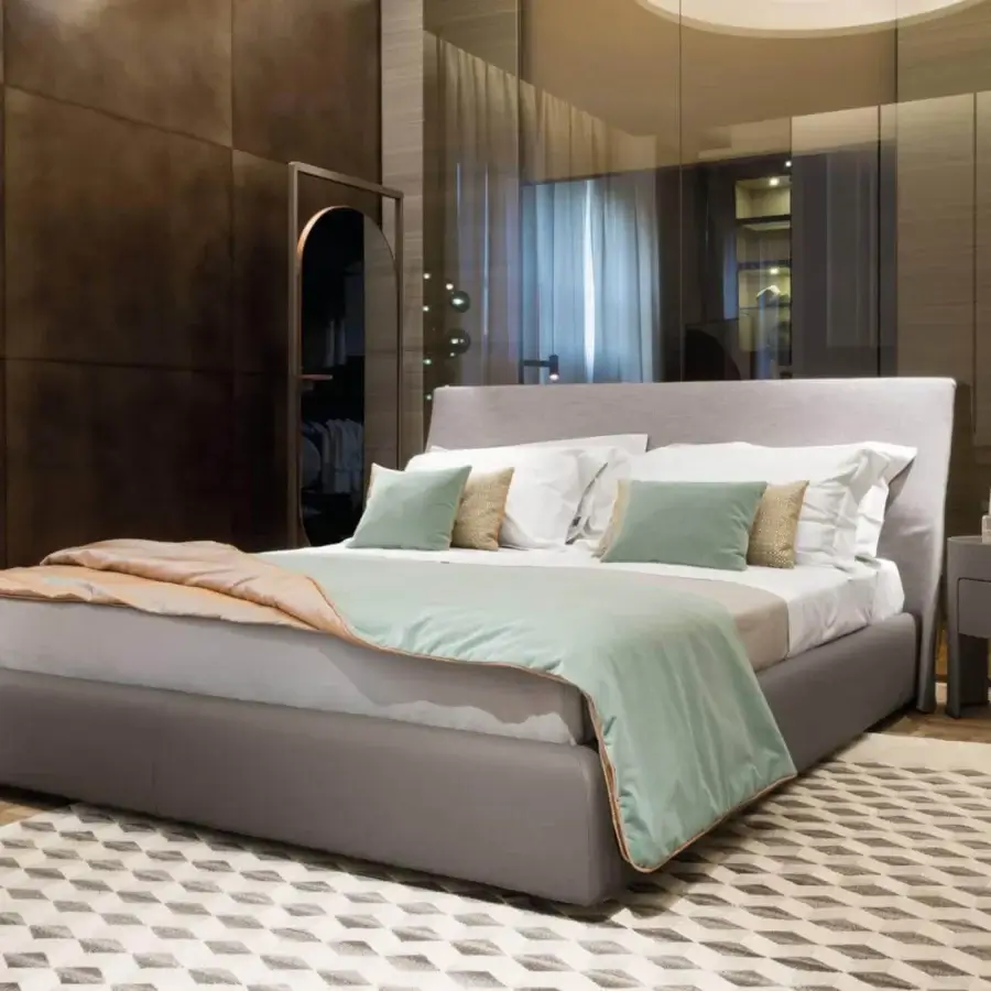 Distinguished Giorgetti Narcisse mirror with painted metal structure and Canaletto walnut frame exhibiting a dark metallic finish