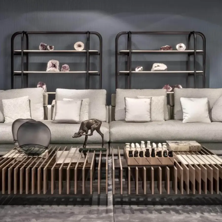 Distinguished Giorgetti Skyline sofa upholstered in light grey textile with reclining headrests and soft goose feather-filled cushions