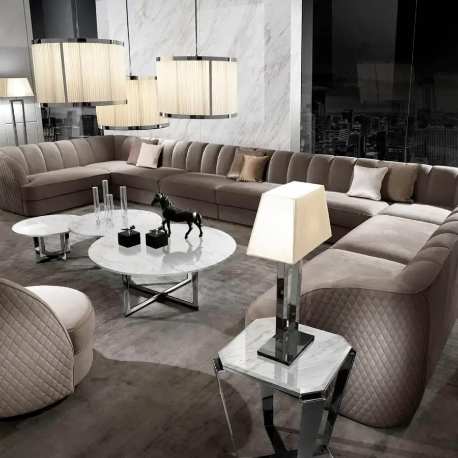 Exceptional DV Home Collection Charlotte sectional in warm gray textile crafted with elegant quilting and solid wood structure