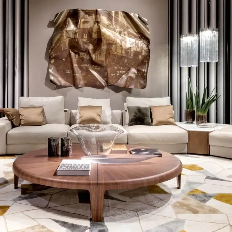 Exceptional Giorgetti Skyline sectional with light cream textile upholstery, select tan and olive green cushions, and a low profile form