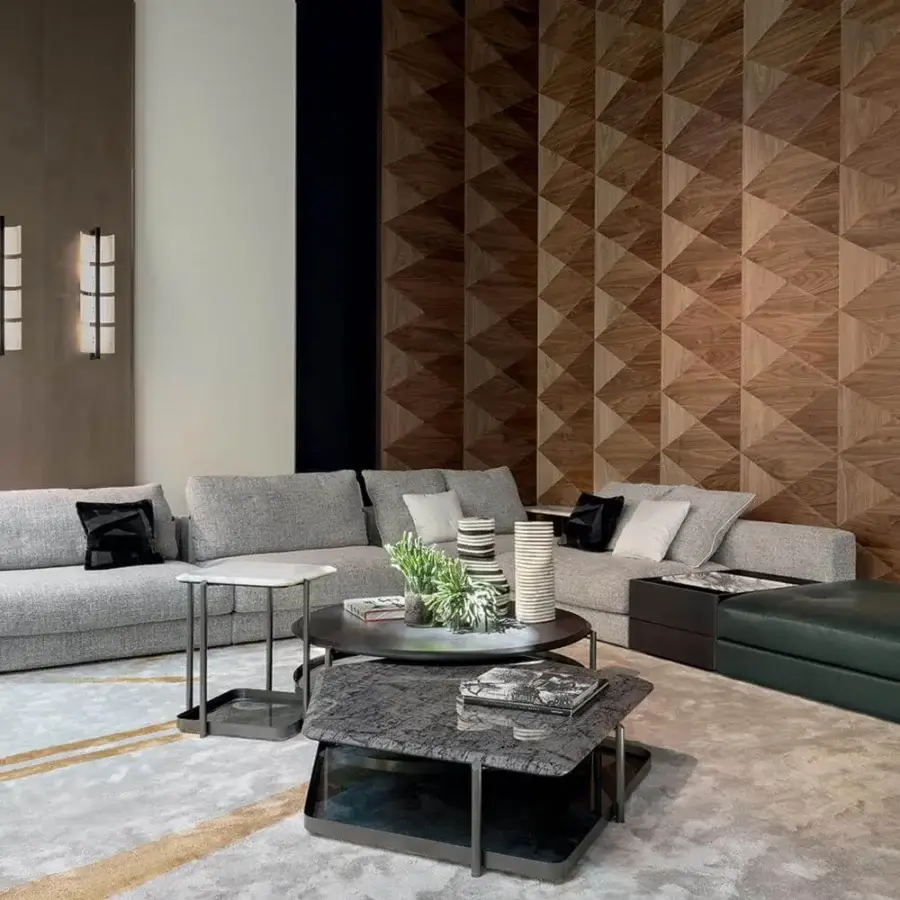 Distinguished Giorgetti Skyline sectional with uniform gray textile upholstery and soft goose feather cushions