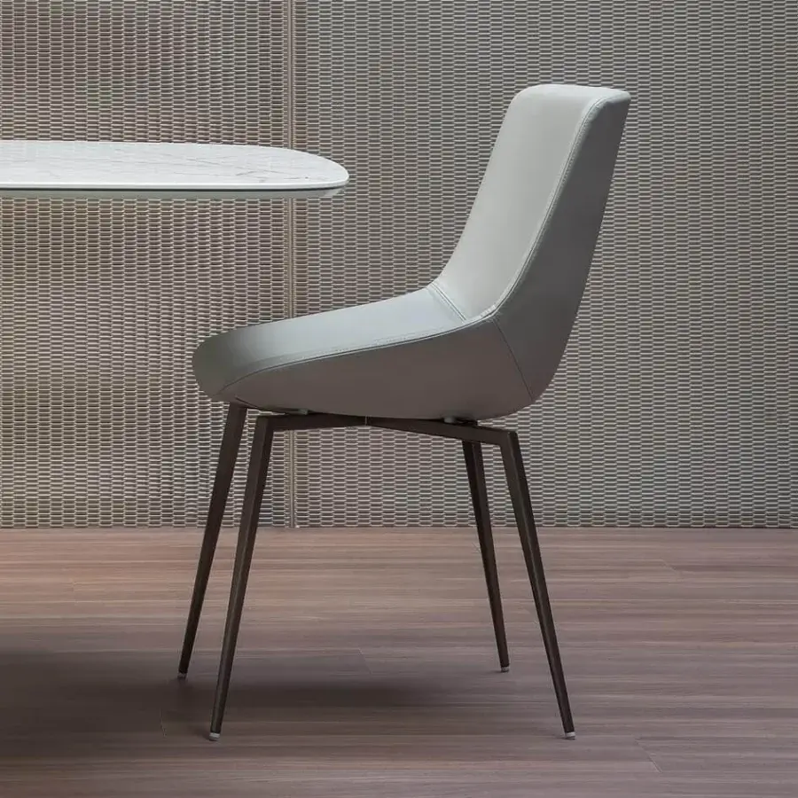 Distinctive Bonaldo Artika chair with light gray coated textile and seamless extended backrest built with dark legs