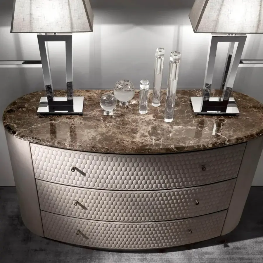 Exclusive DV Home Collection Charlotte dresser with light beige leather, hexagon quilting and a marble-patterned top with metallic base
