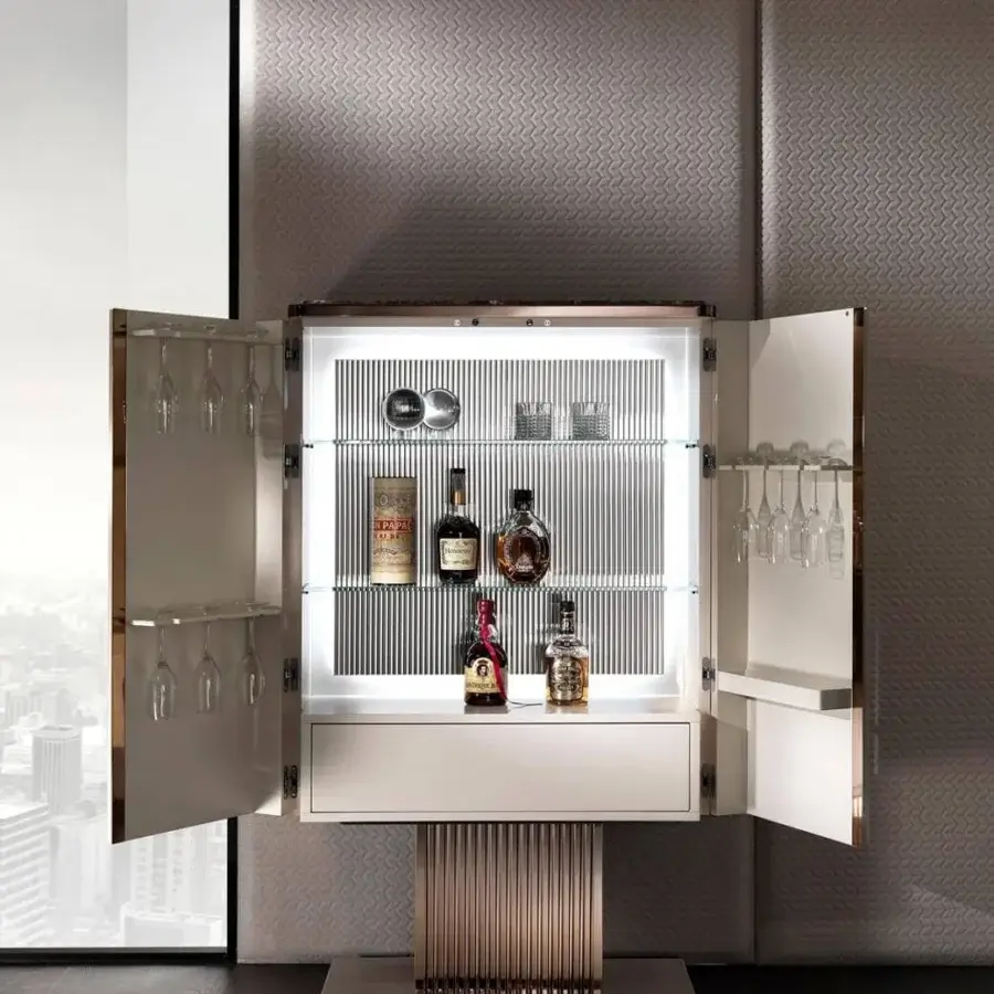 Exclusive DV Home Collection Elite bar cabinet with cream leather doors and gold stainless steel base in matt lacquered finish