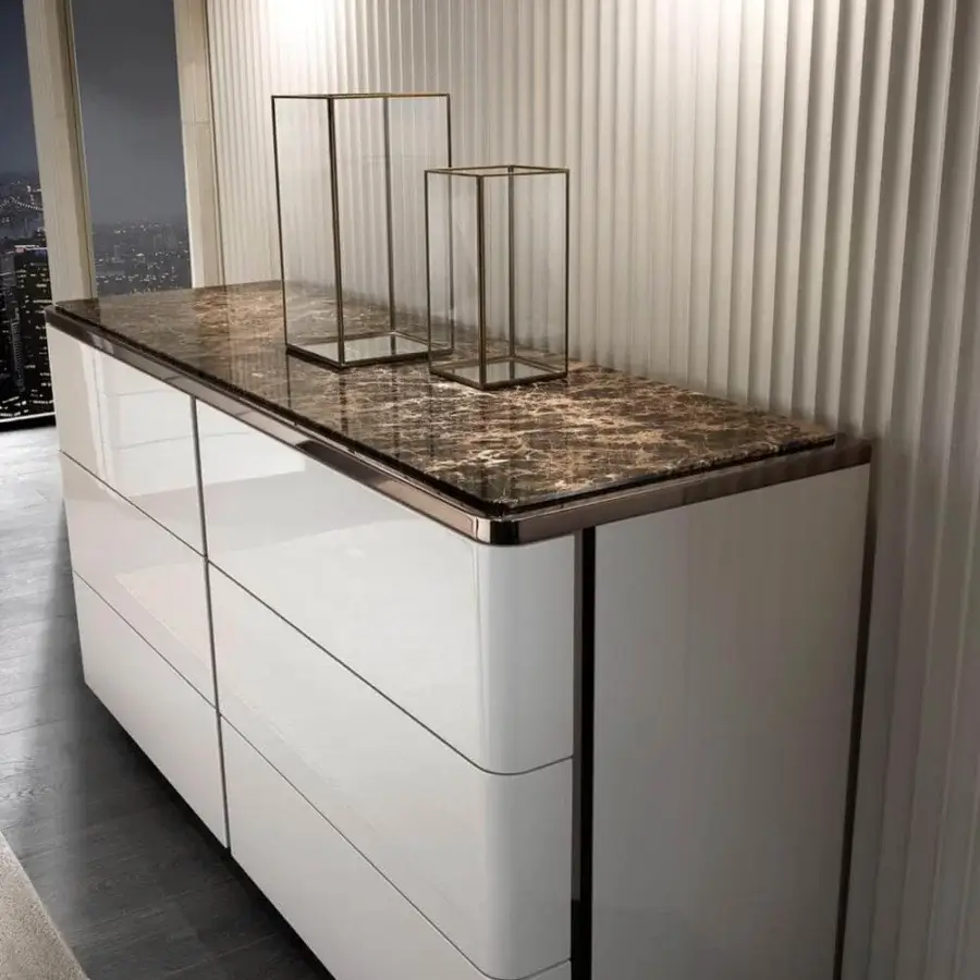 Elegant DV Home Collection Elite dresser with six drawers, glossy lacquered finish and brown marble-patterned top with stainless steel trim