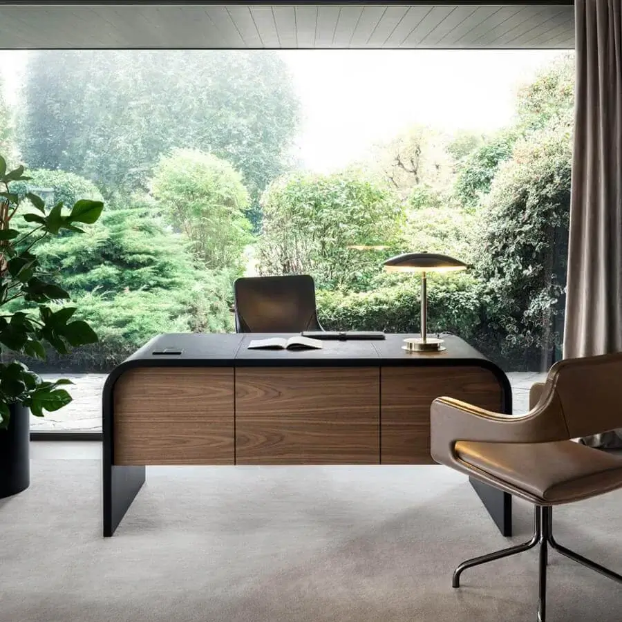 Superior 4 Mariani Nami desk with curved saddle leather and veneered wood, exhibiting a dark top with light wood drawer fronts